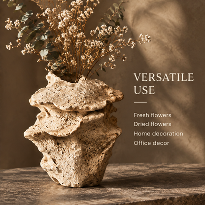 Artistic clay ruffle vase with dried flowers and eucalyptus on a stone surface — clean lifestyle product shot